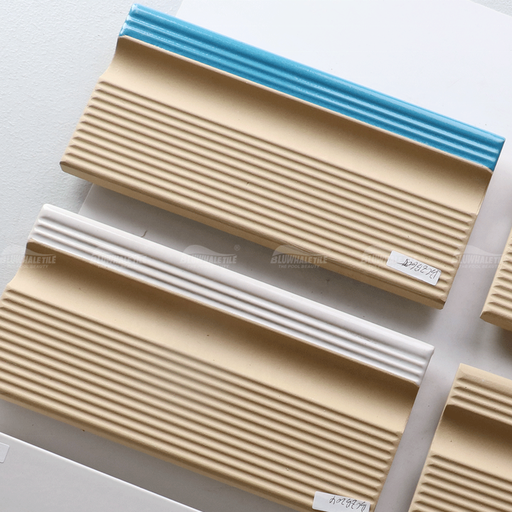 [103006040180] Gạch men cạnh hồ bơi hình mũi bò màu xanh nhạt 240x115mm